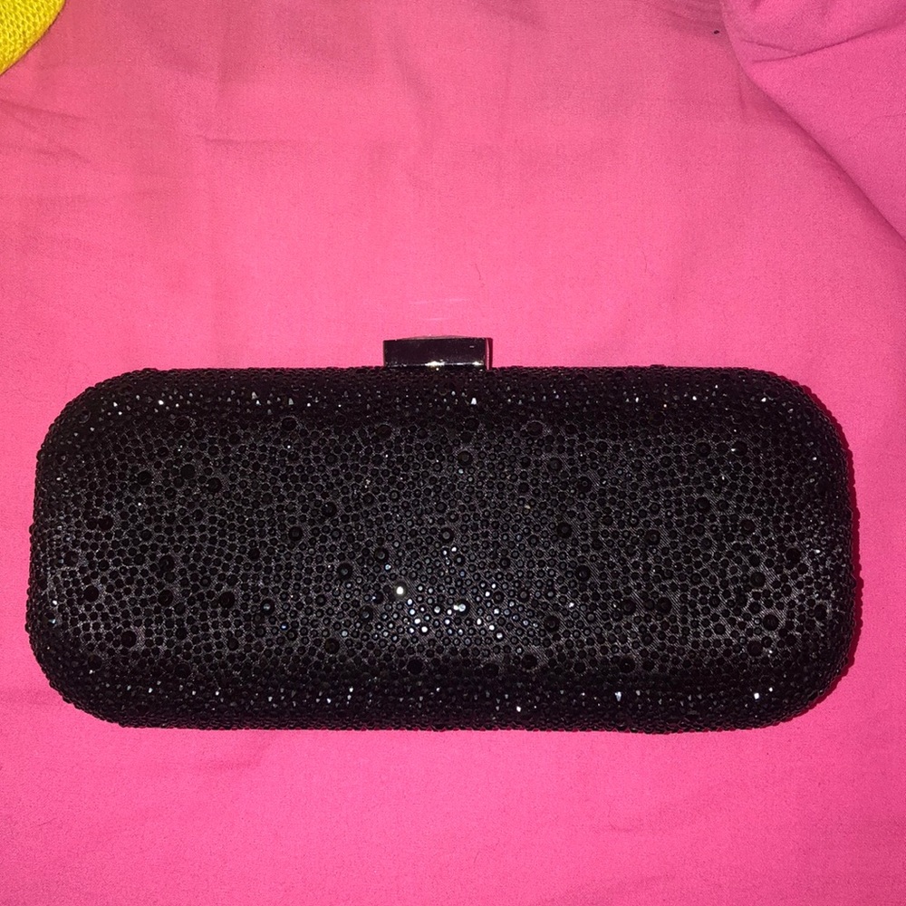 Black gemmed clutch bag